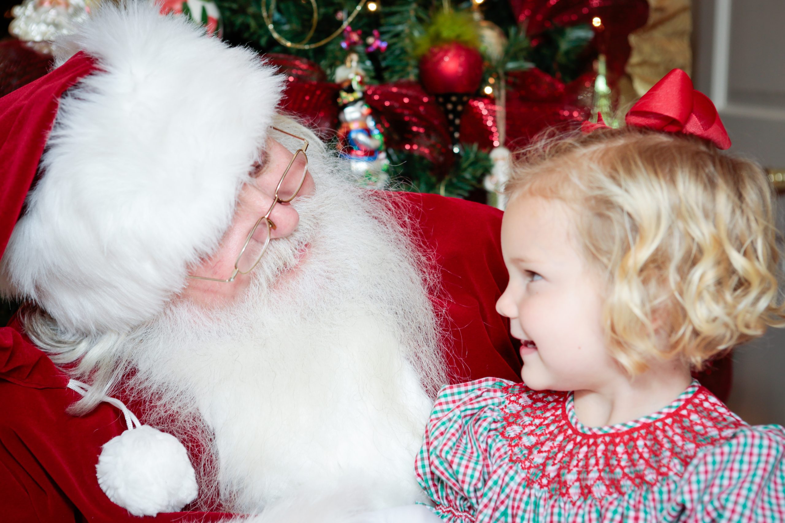 Santa talking with a young child