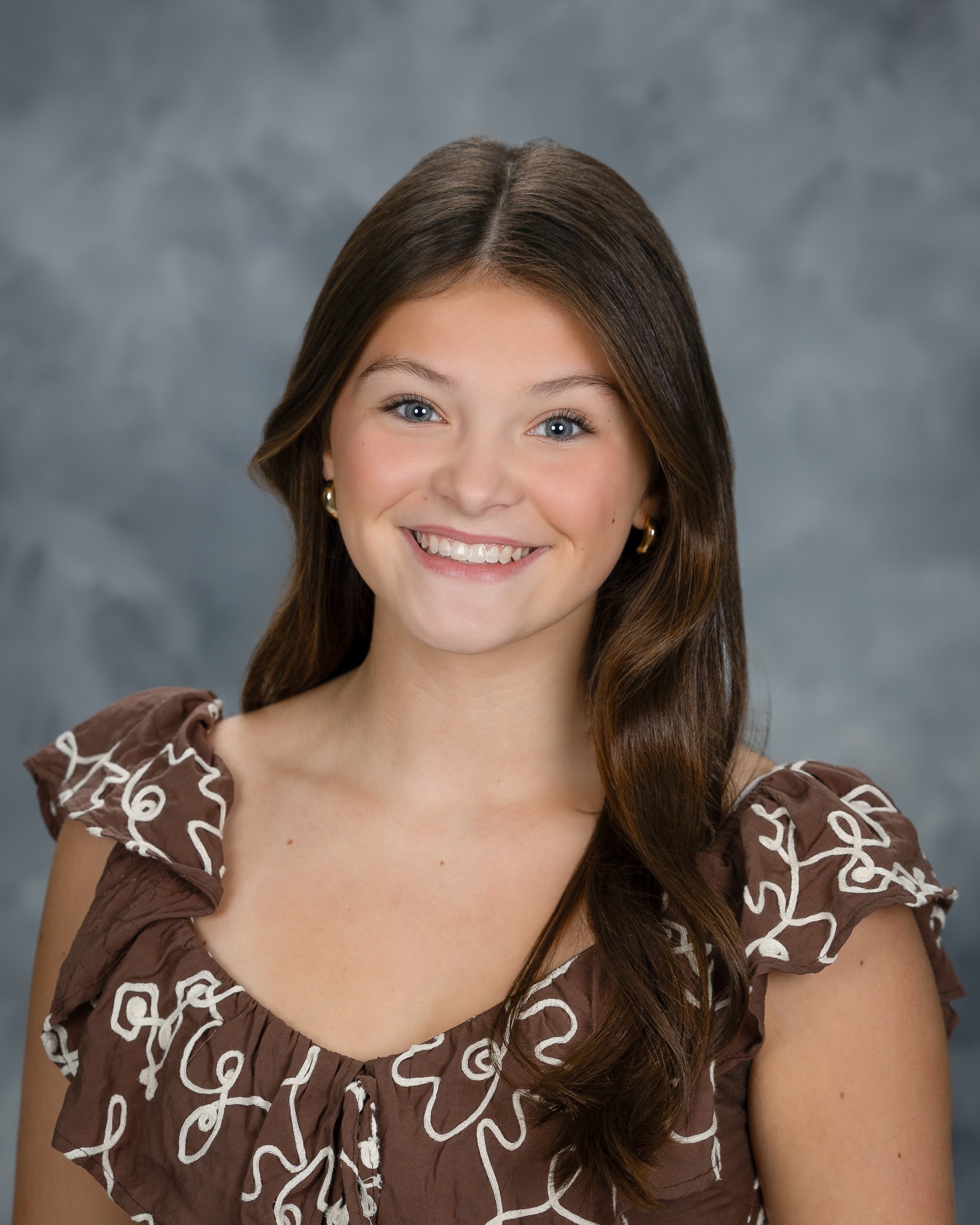 Smiling student in a school portrait